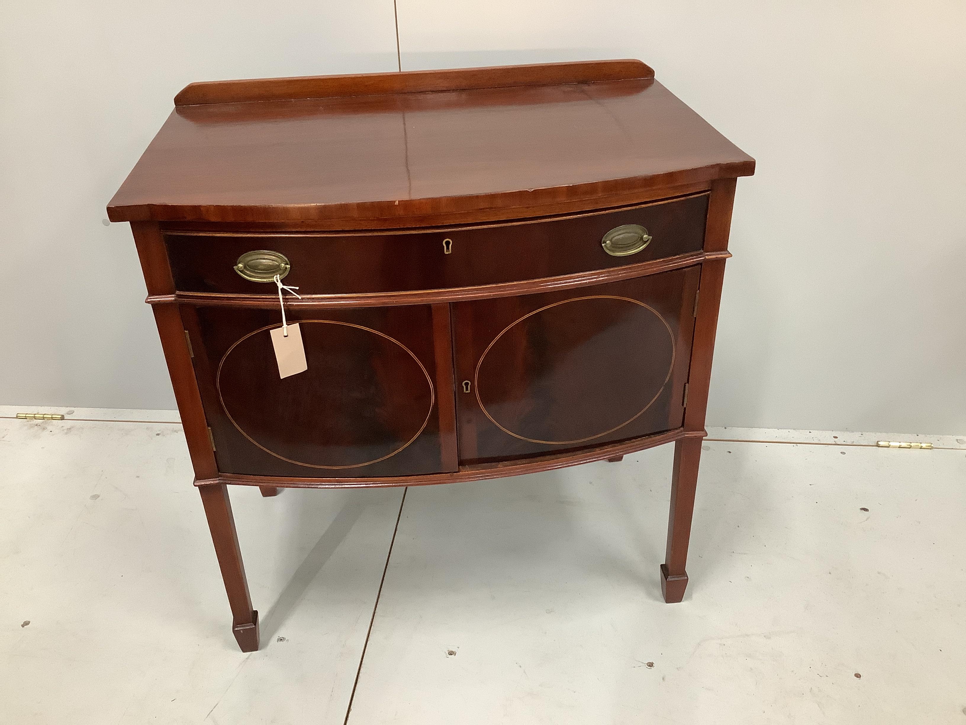 A small Edwardian mahogany bowfront side cabinet, width 76cm, depth 49cm, height 80cm